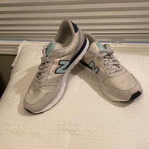 Size 11 Cream New Balance tennis shoes. Excellent condition!